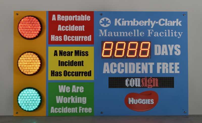 Digital safety sign with stoplights, numeric display and scrolling message